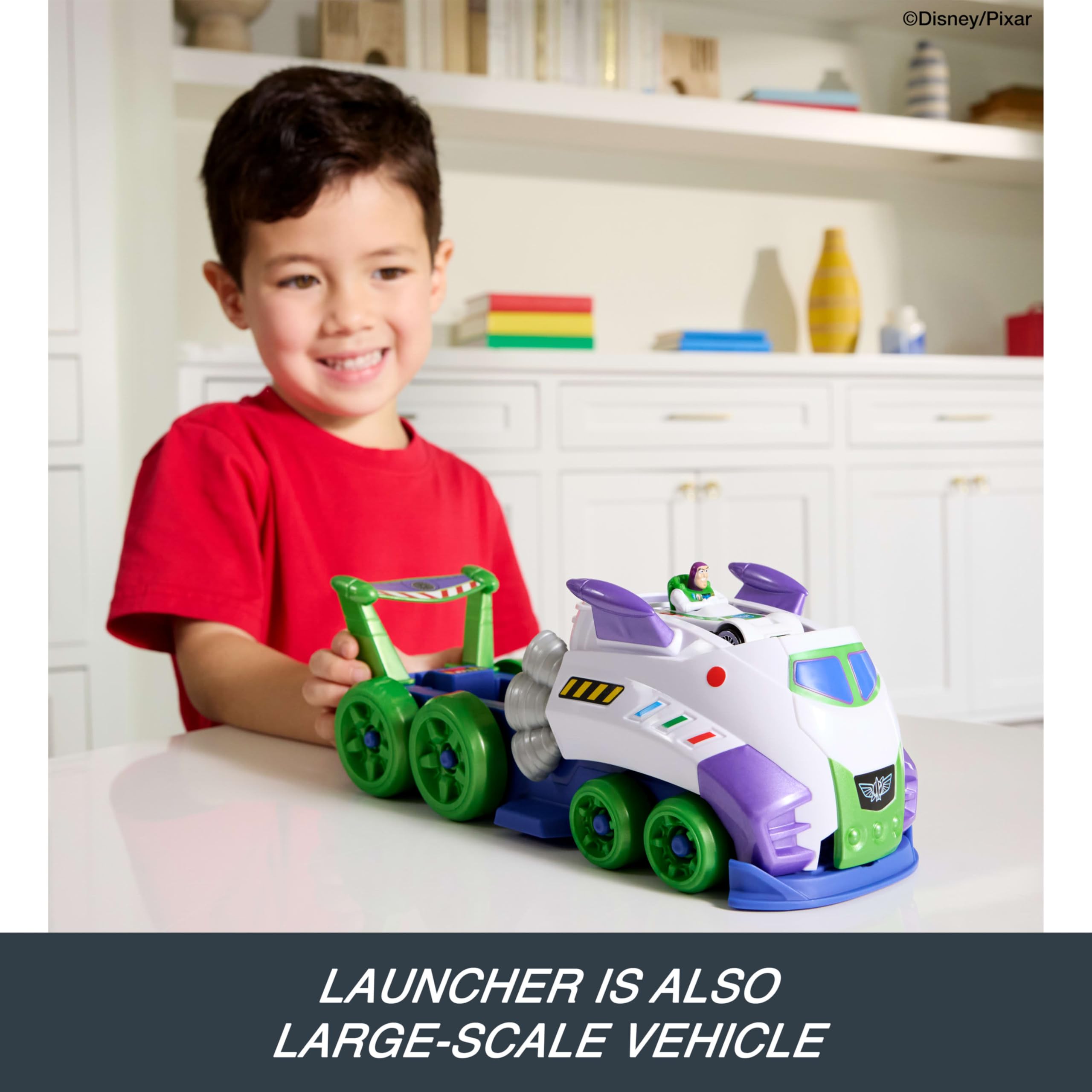 Hot Wheels launcher button detail demonstrating quick-launch function for fast play
