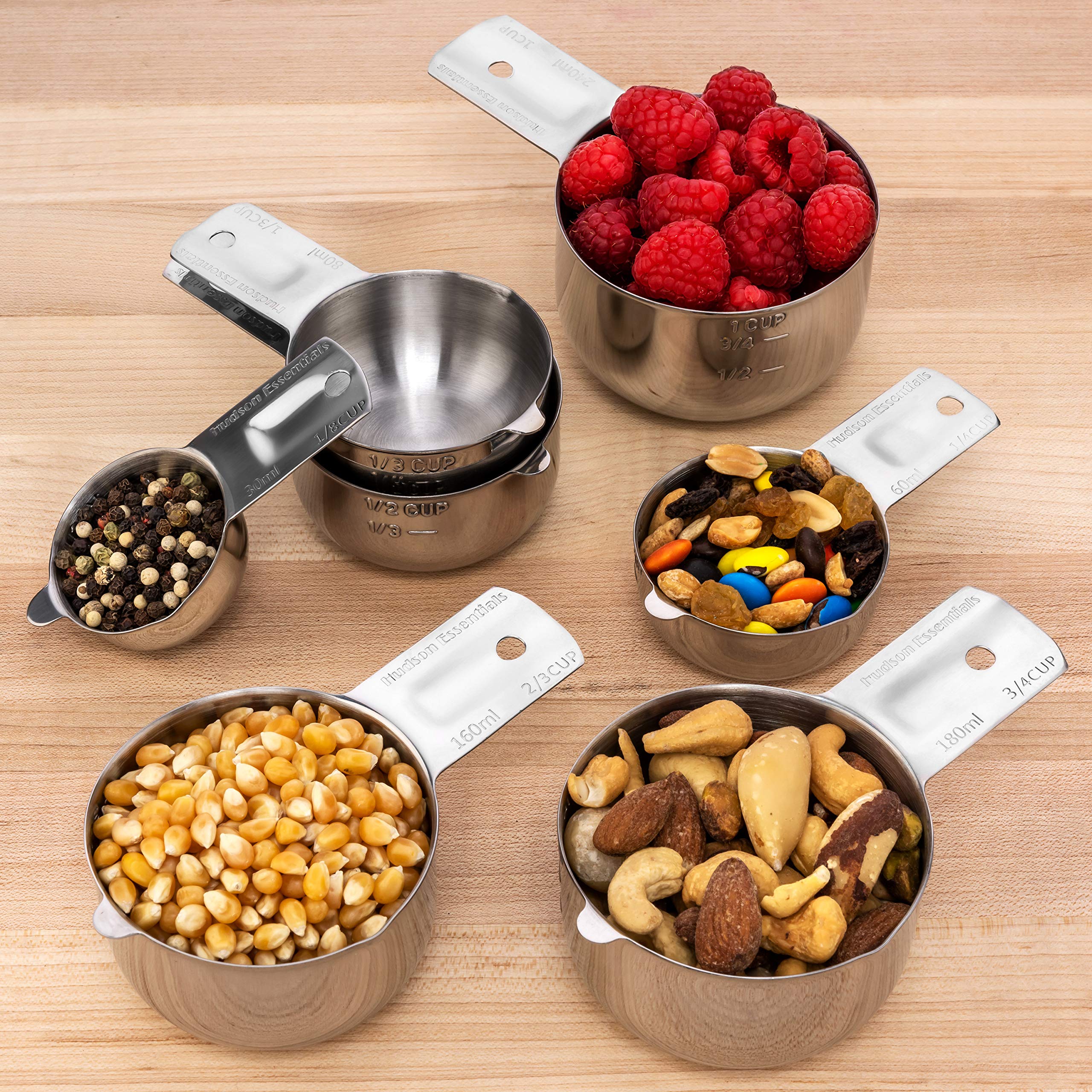 Hudson Essentials cup scooping flour in action showing reliable grip and consistent scooping