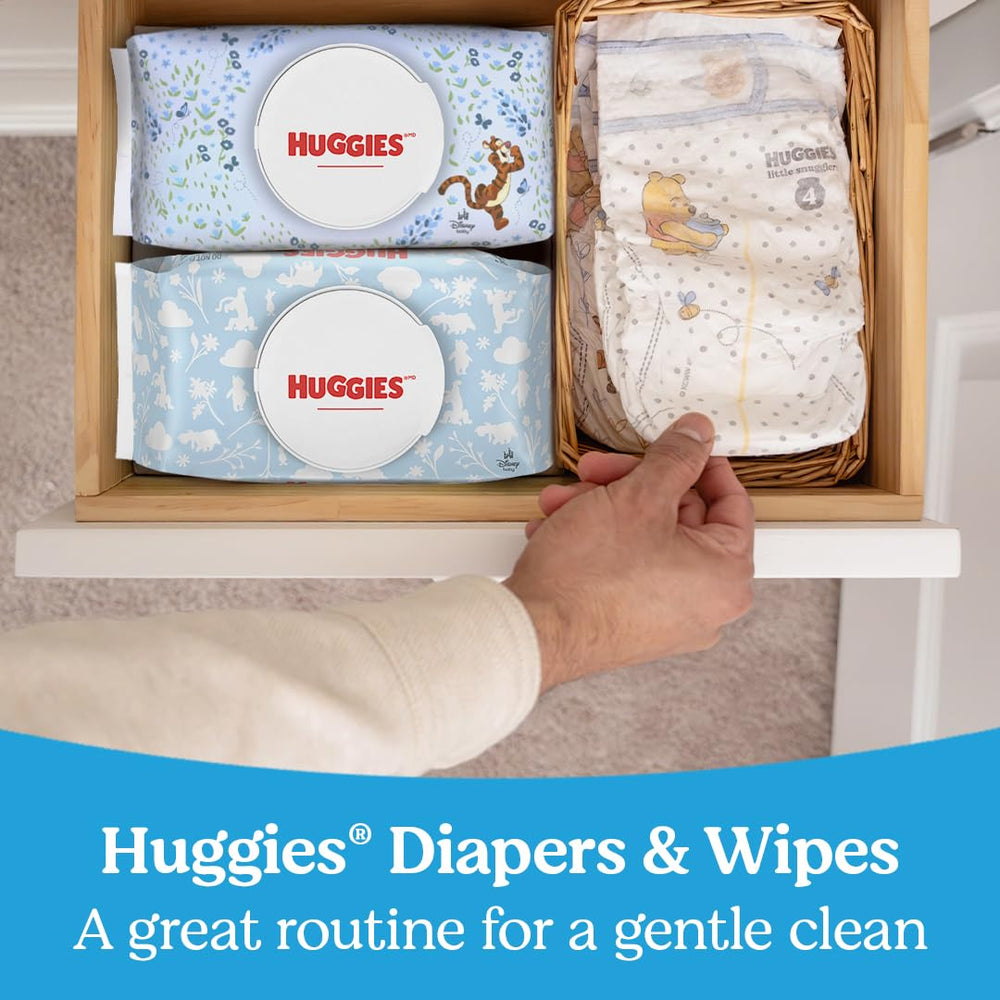 HUGGIES wipes at changing table in lifestyle scene showing effortless cleanup