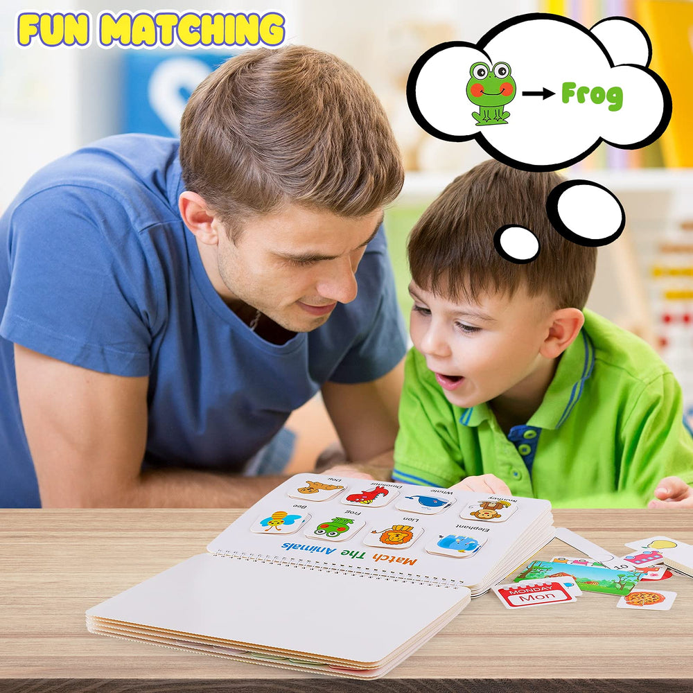 Huijing child using the busy book promoting independent learning and fine motor skills