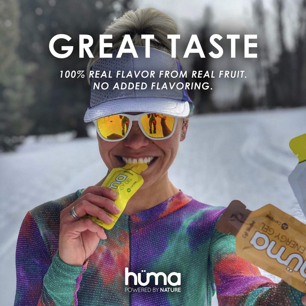 HÜMA CHIA ENERGY GEL sachet in athlete hand illustrating portable race-ready fuel