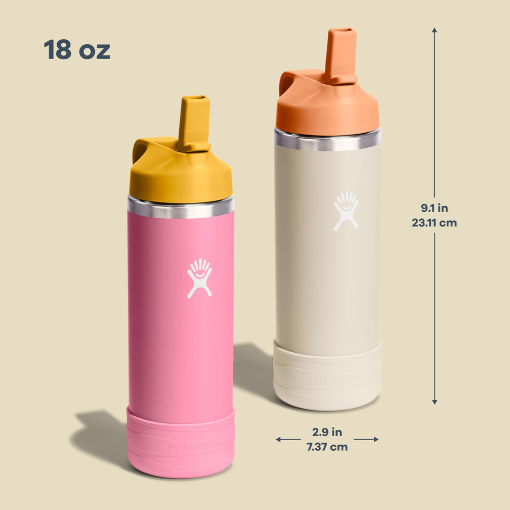 Hydro Flask slim profile held in small hand showing comfortable carry for kids