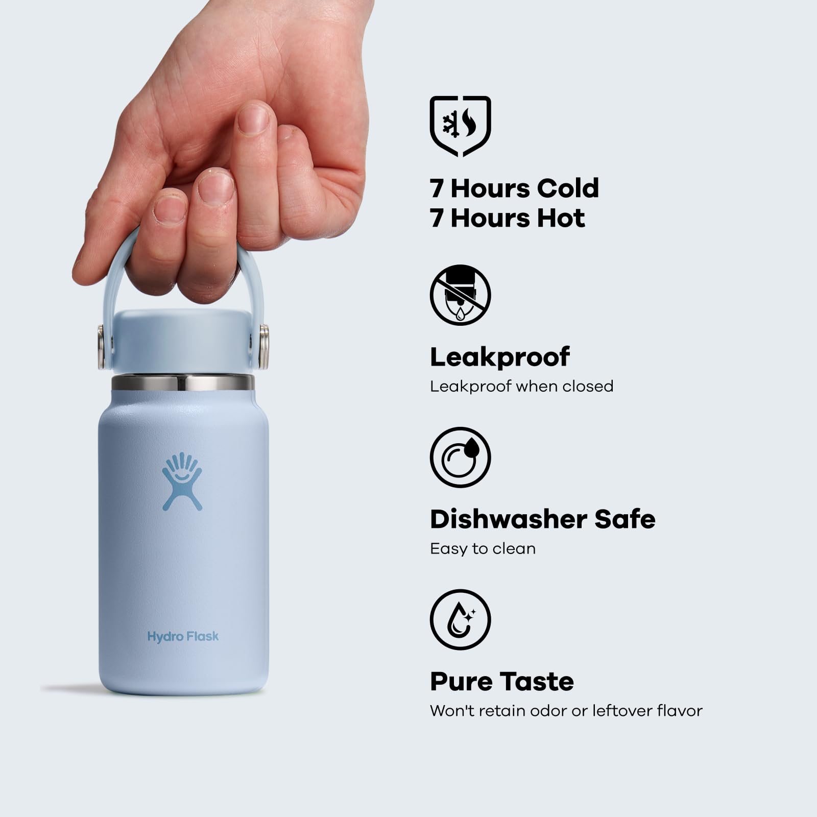 Hydro Flask Micro beside a phone in pocket for scale, showing pocket-friendly size