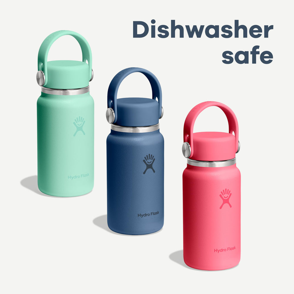 Hands holding Hydro Flask Micro in lifestyle scene showing easy one-handed use