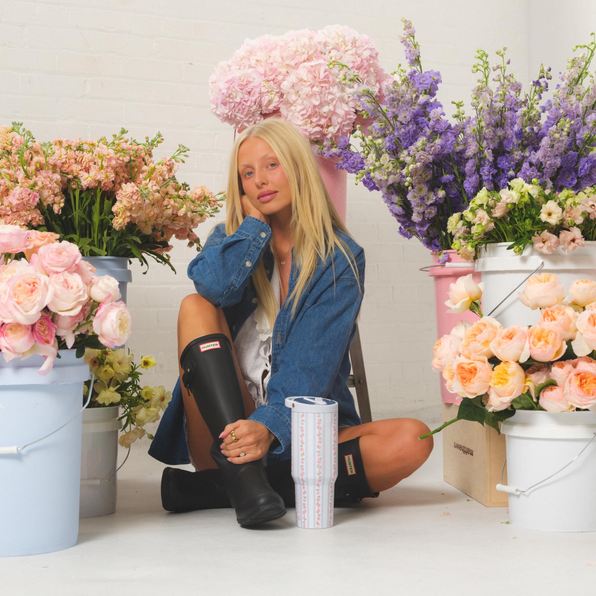 HydroJug Primrose beside a phone for 32oz size and daily convenience