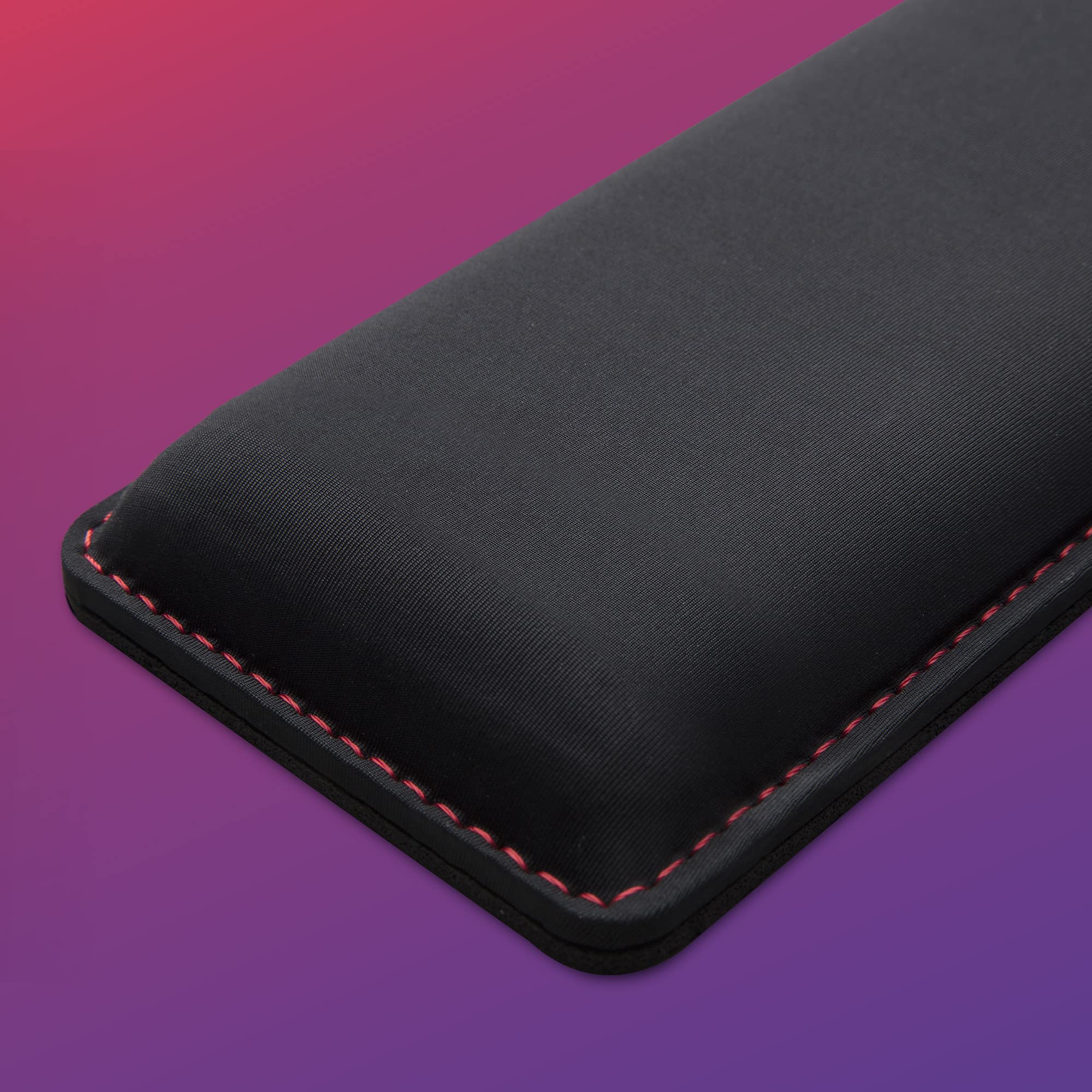 HyperX wrist rest underside showing natural rubber anti-slip grip for desk stability