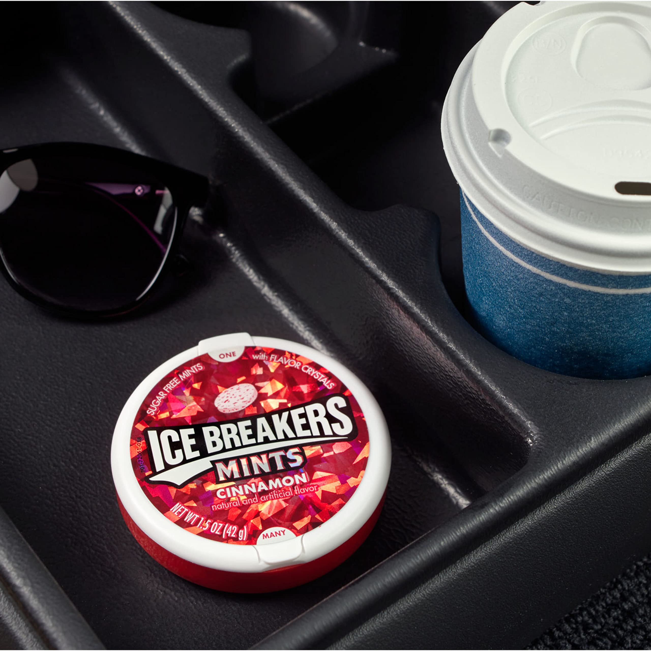 Ice Breakers tin on desk lifestyle scene showing quick office refreshment