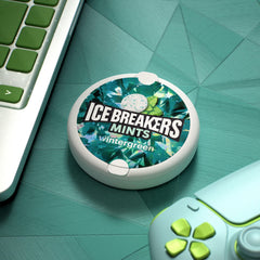 Ice Breakers tin in hand demonstrating pocket-size convenience benefit