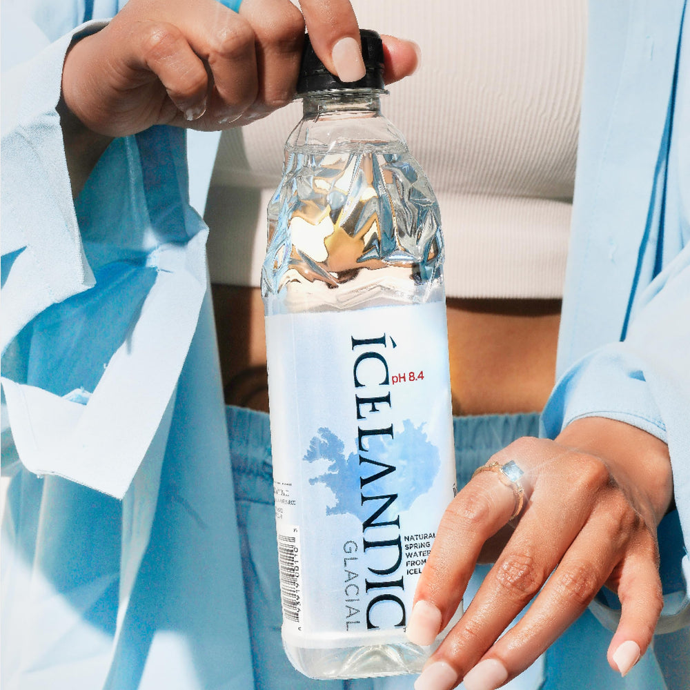 Icelandic Glacial rPET recycle symbol on bottle highlighting sustainable packaging