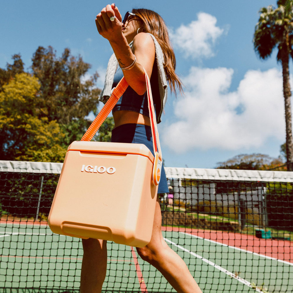 Igloo Tag Along Too worn crossbody in a lifestyle scene for active, on-the-go use