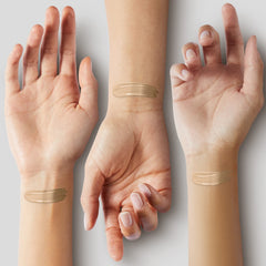 ILIA drop of tint on fingertip demonstrating spreadability