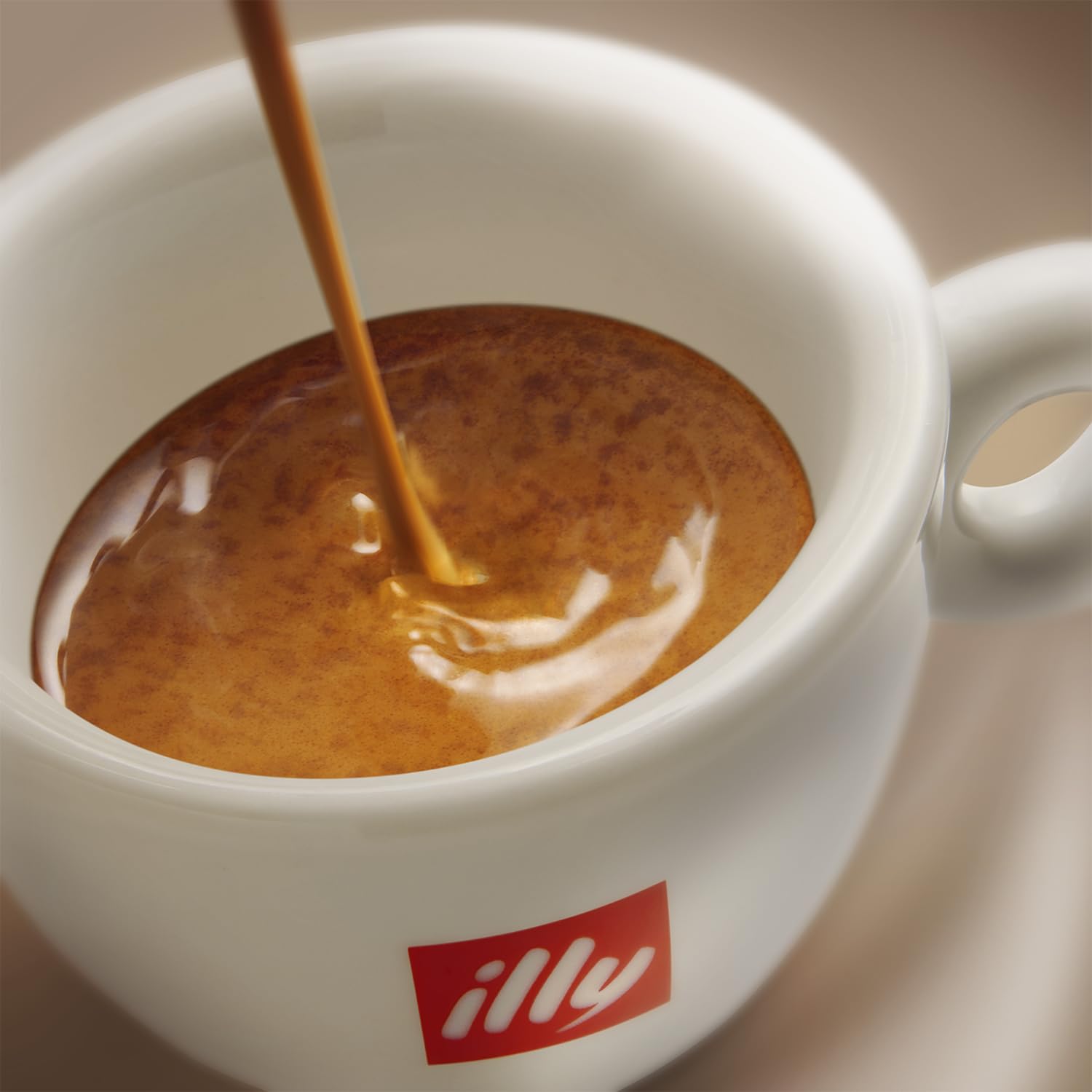 illy tin on a kitchen counter with cup, conveys approachable Italian mornings