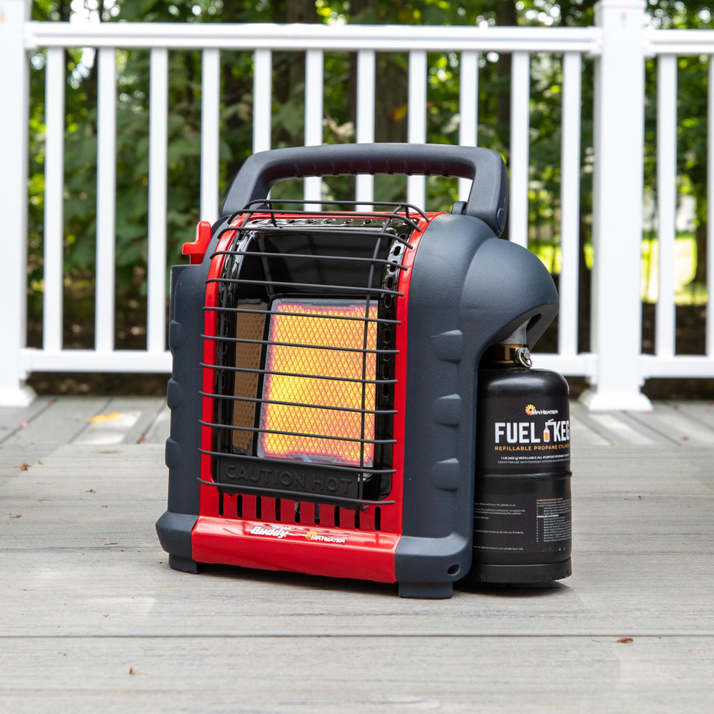 Mr. Heater fuel cylinder beside a portable outdoor heater.
