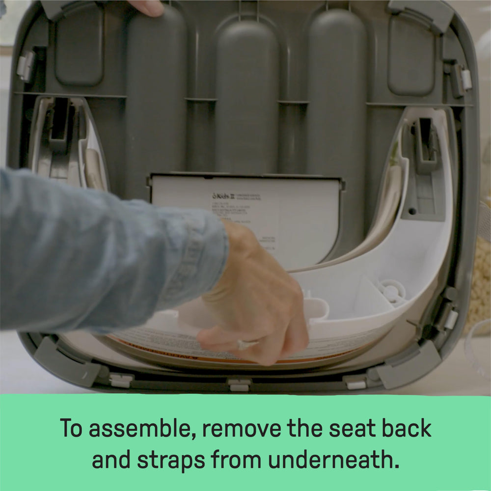 Ingenuity Baby Base tray stored under seat demonstrating tidy storage benefit