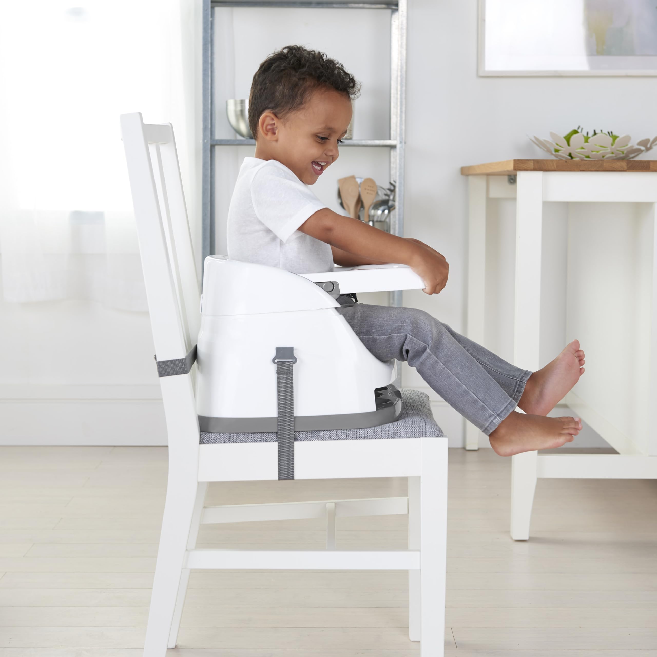 Ingenuity used as a floor seat showing comfortable play and snack space
