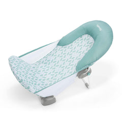 Ingenuity folded bather front view showing stable frame and sling support