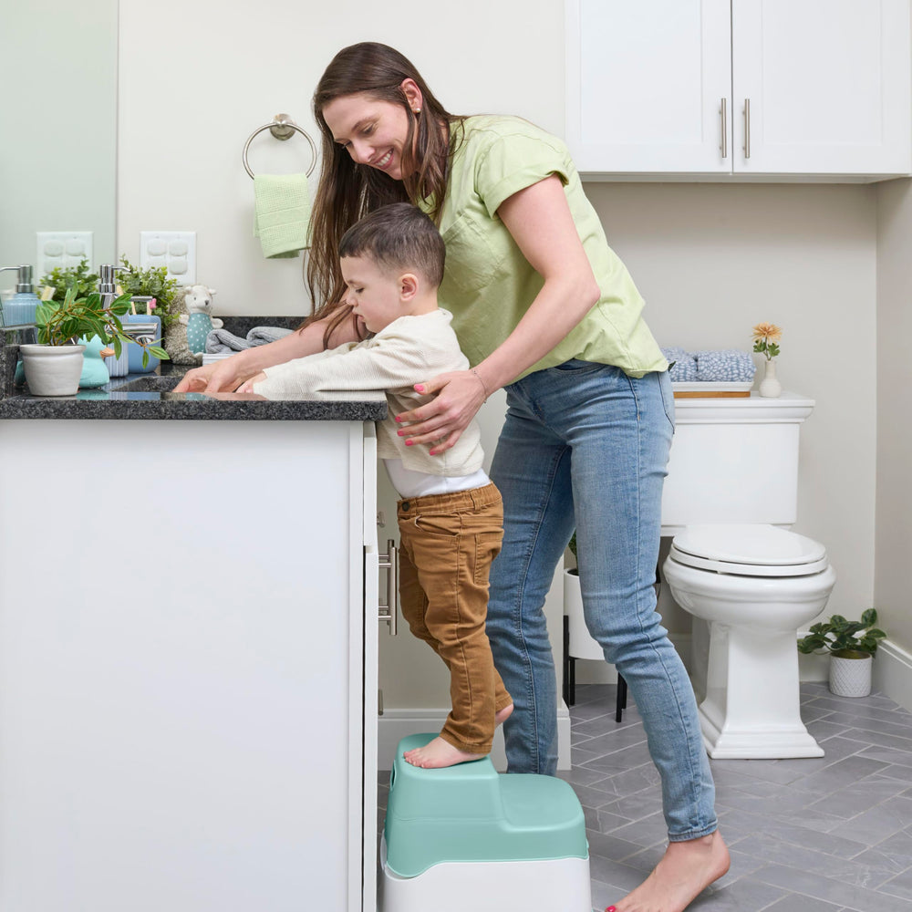 Ingenuity side-by-side size comparison with adult toilet for scale