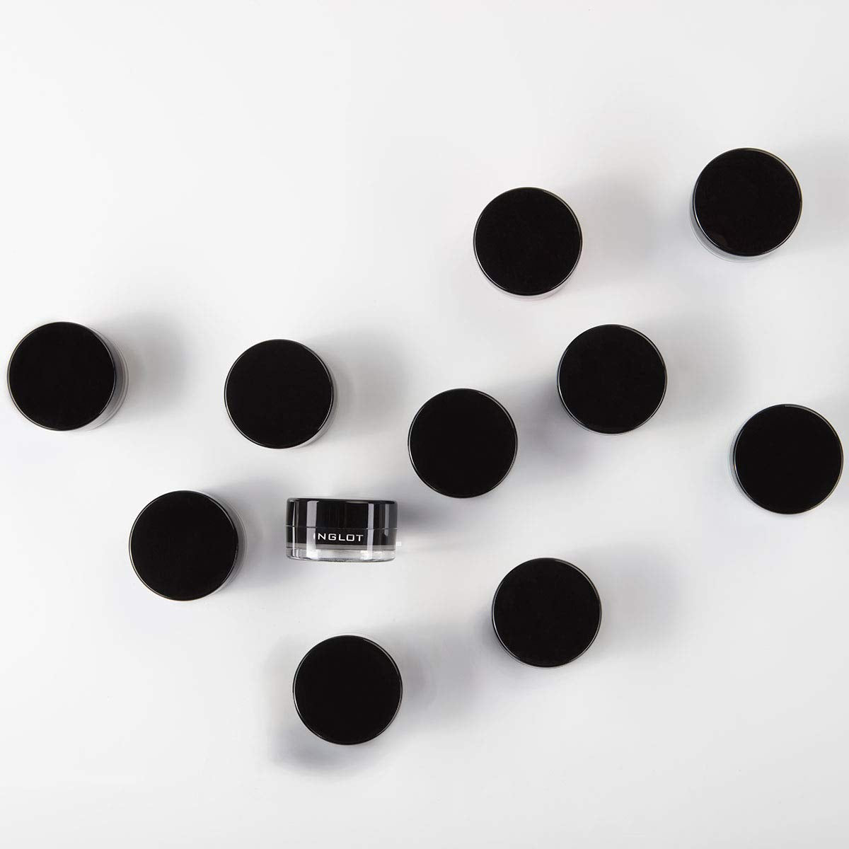 Inglot swatch on hand showing buildable black coverage and blendability