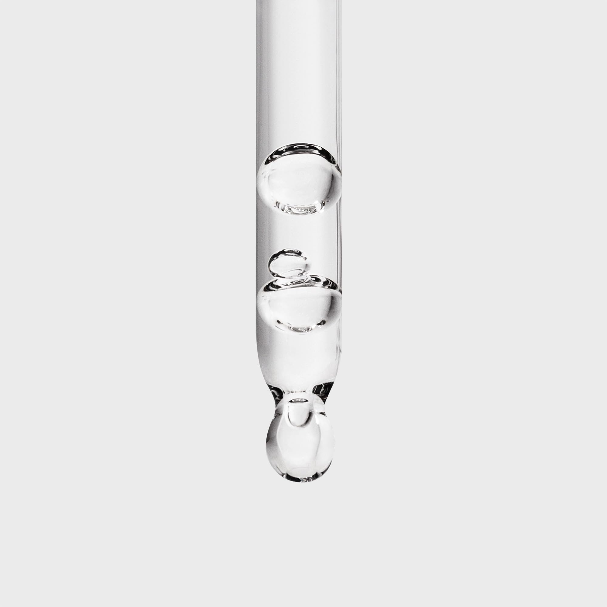 Inglot Duraline pipette detail illustrating precise drop dosing for hygienic mixing and control