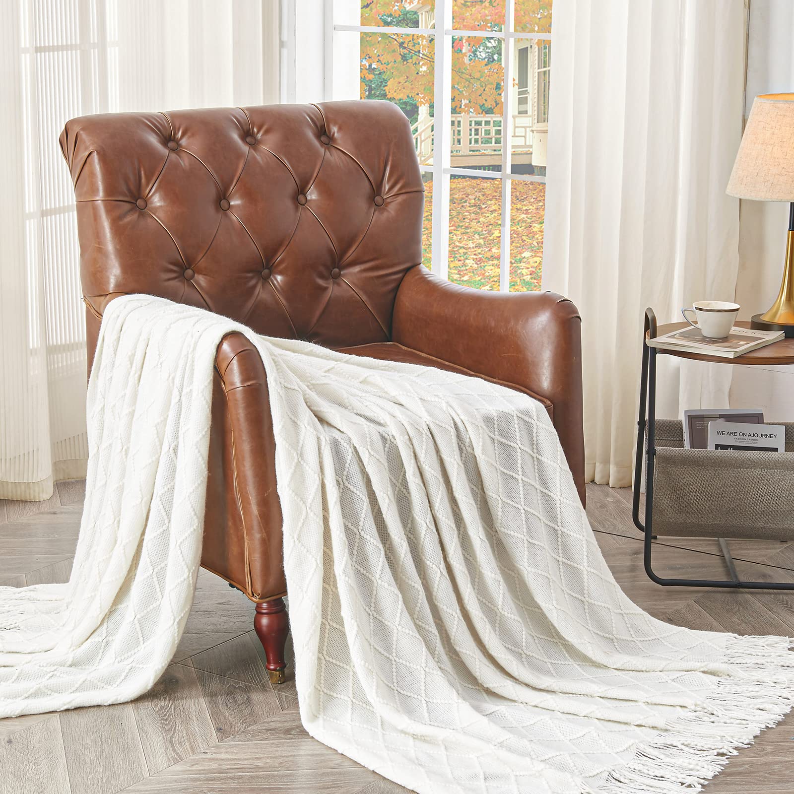 inhand material touch closeup shows acrylic softness and lamb-wool-like comfort benefit
