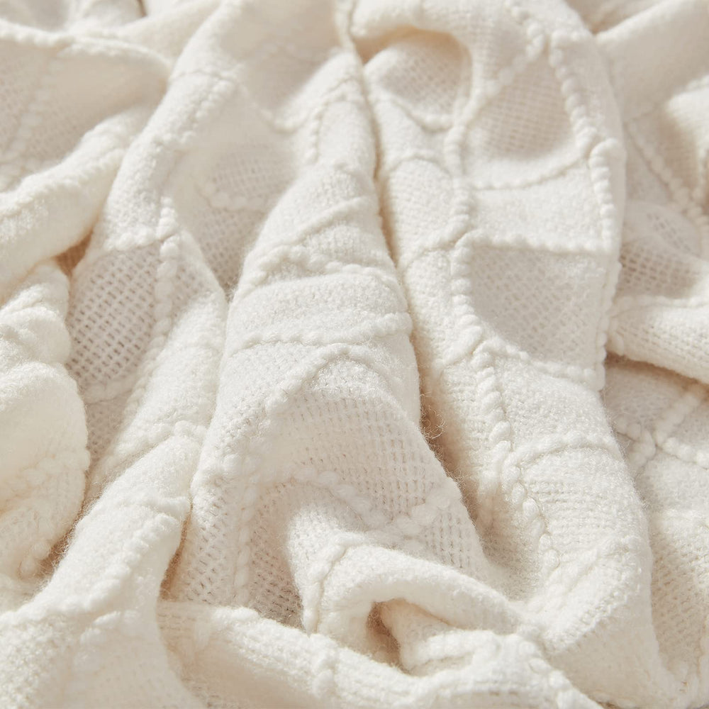 inhand throw used as travel shawl shows portable warmth and travel comfort benefit