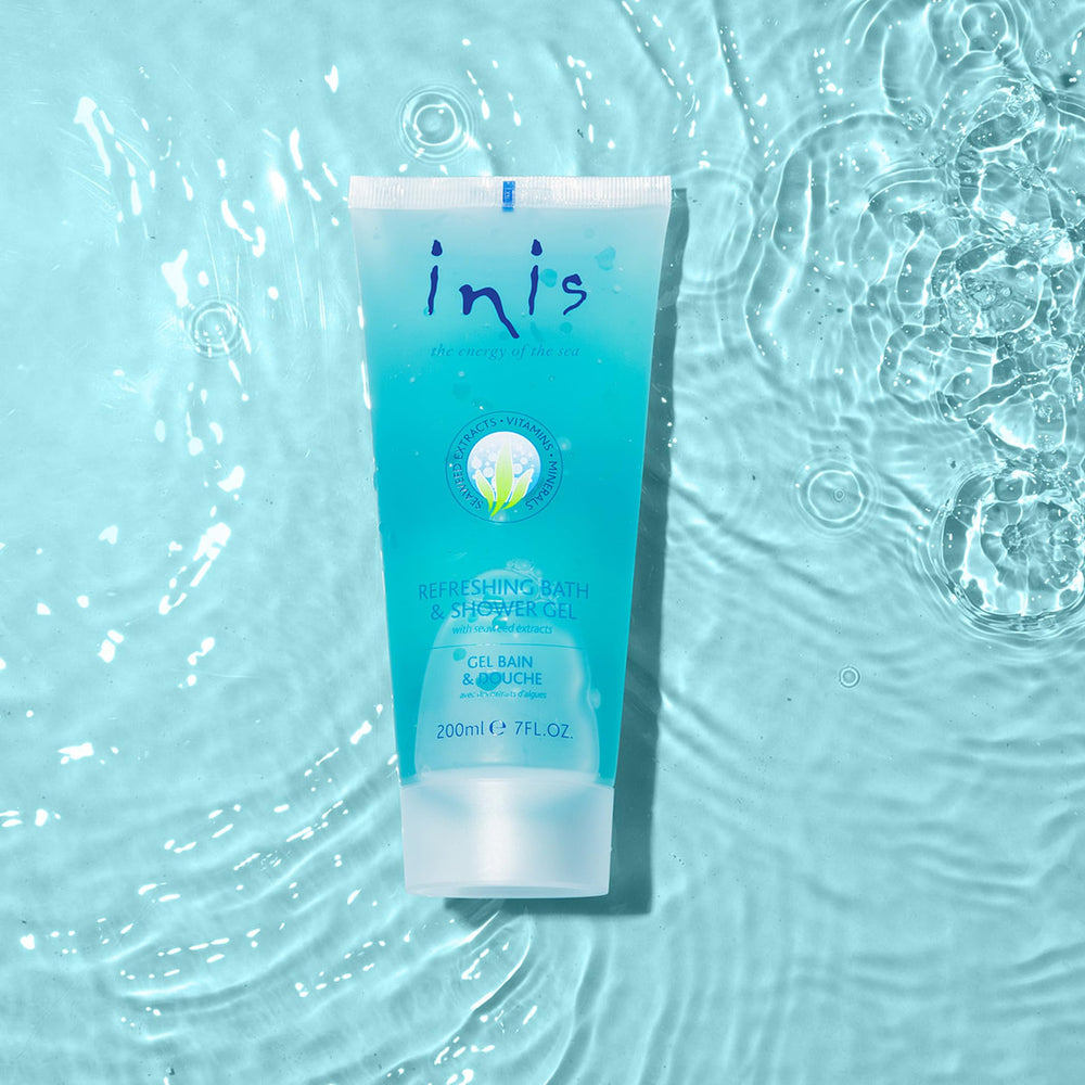 Inis bottle beside seaweed and minerals showing natural hydration