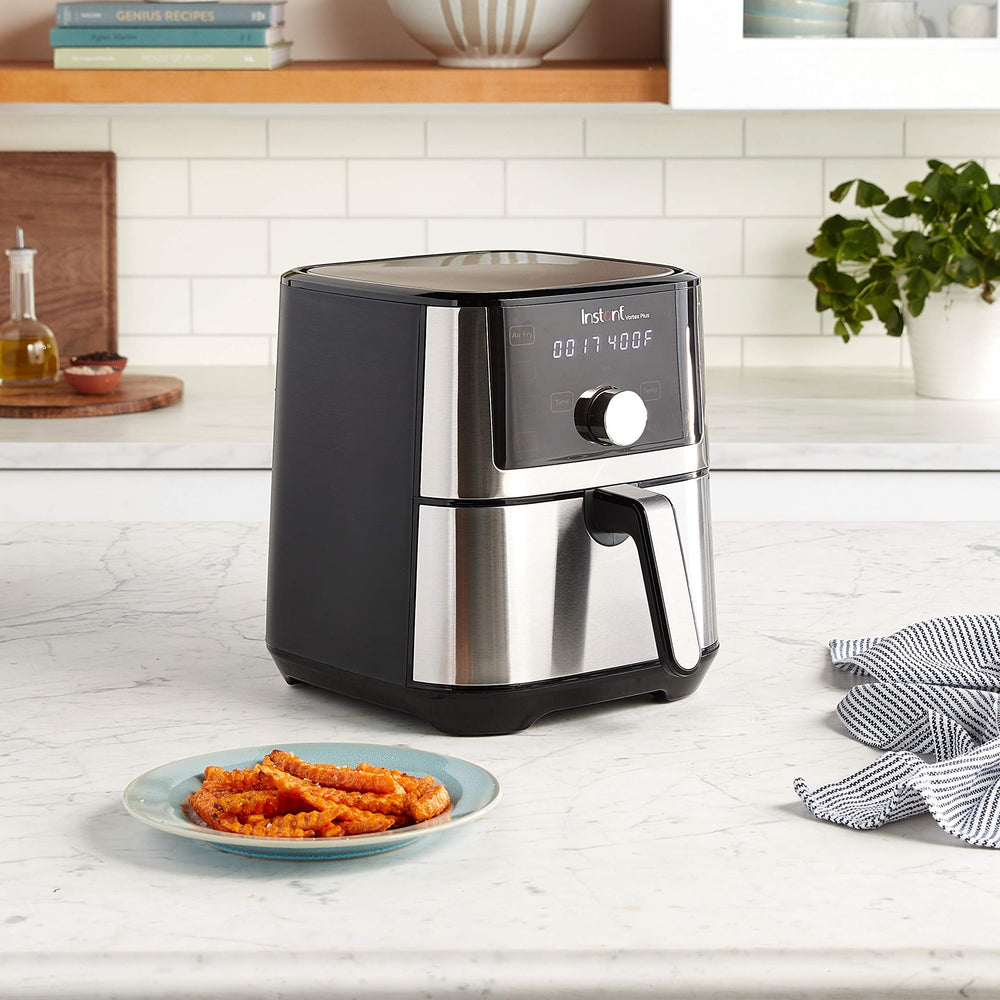 Instant Pot touchscreen display close-up, easy one-touch controls and clear cooking stages for convenience