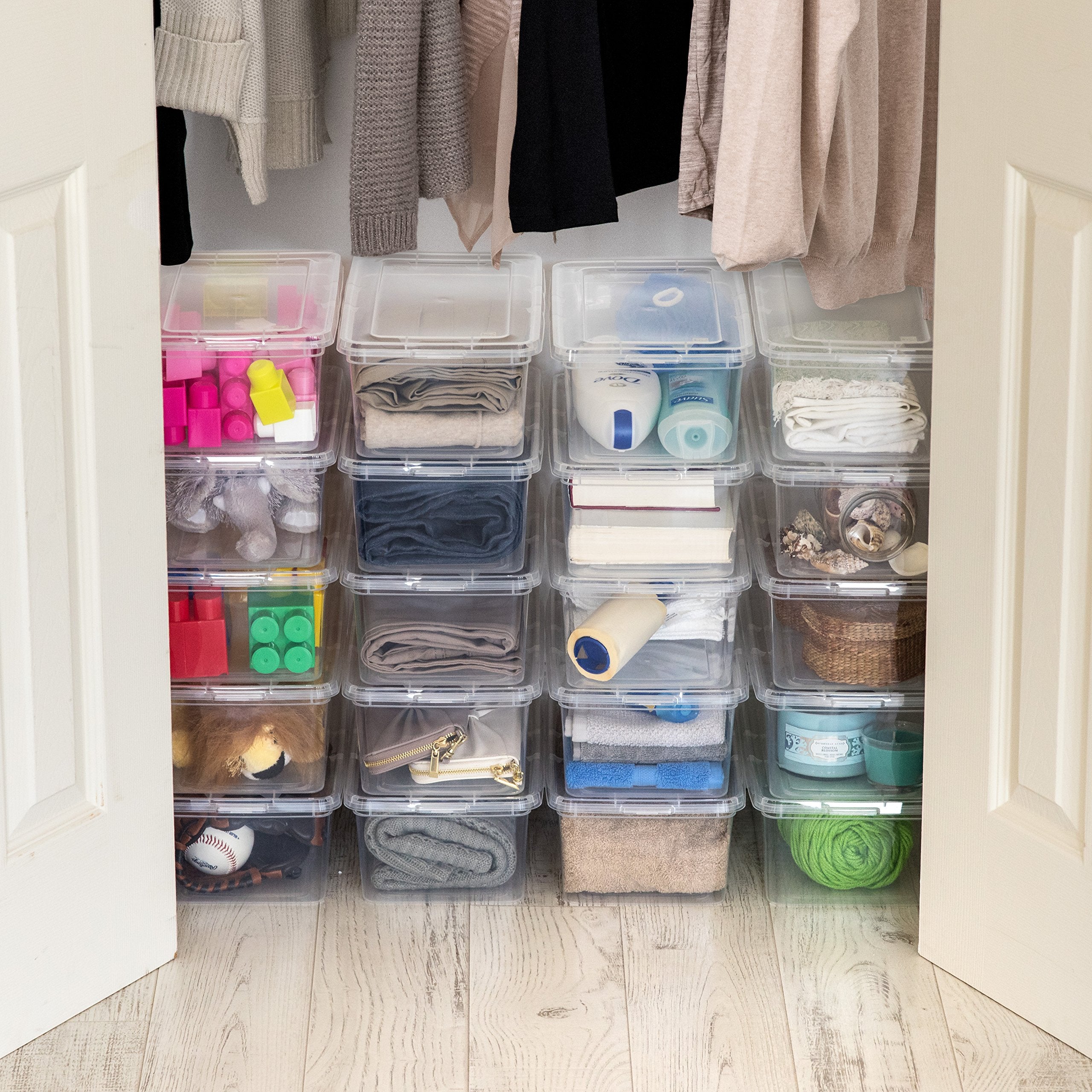 IRIS USA bins stored in craft room illustrating neat workspace efficiency