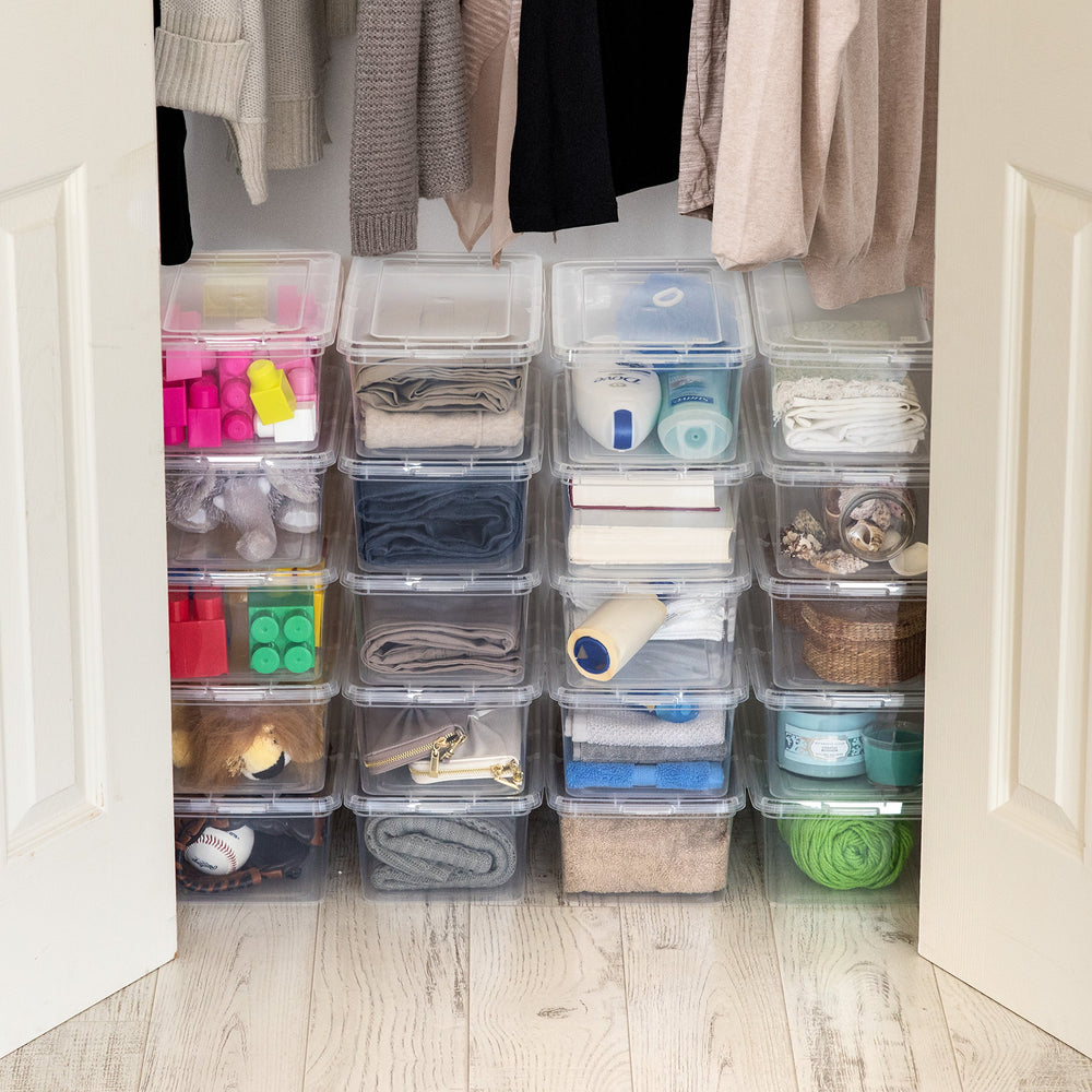IRIS USA bins stored in craft room illustrating neat workspace efficiency