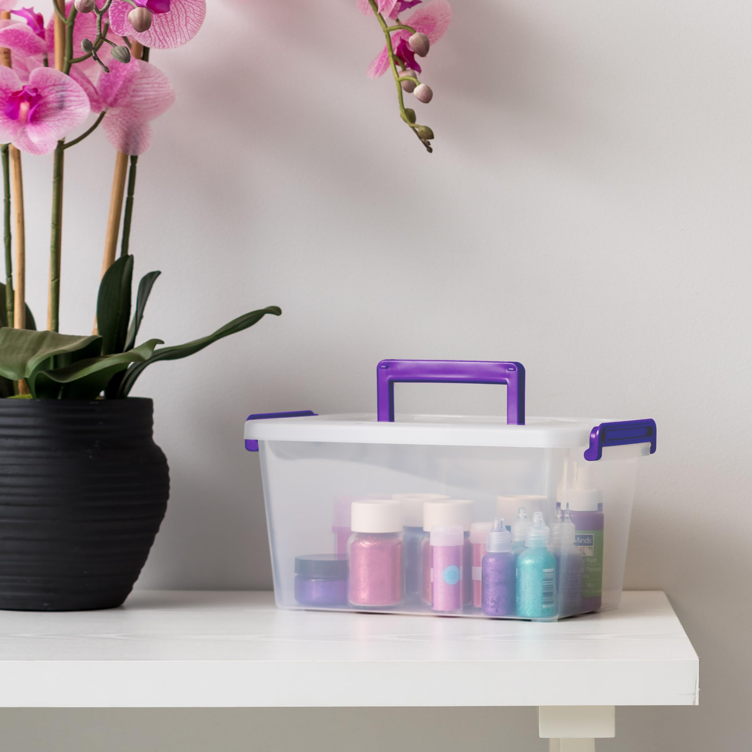 IRIS USA built-in handle being carried for convenient portability