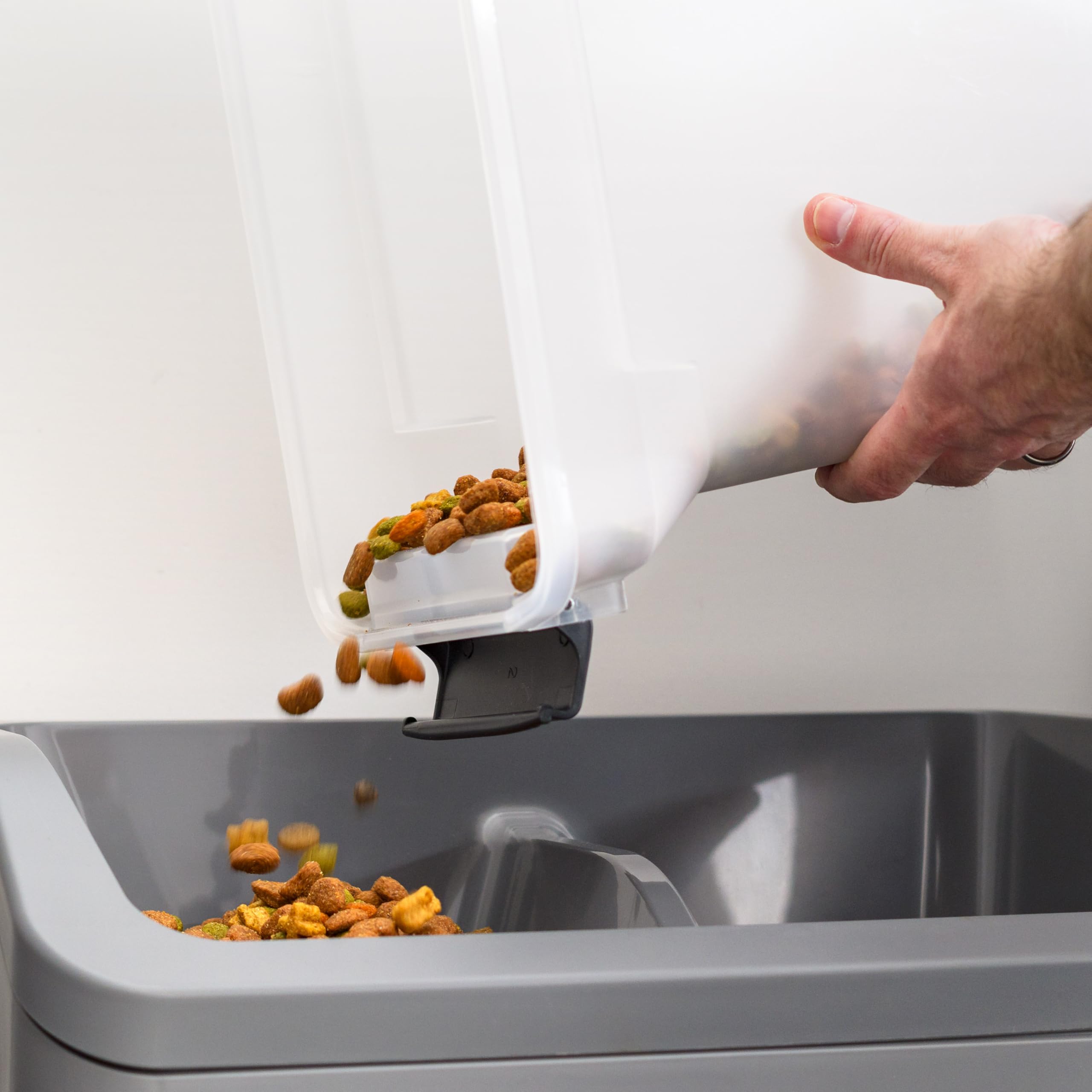 IRIS USA beside a cereal box to illustrate 13 lb capacity and compact scale for space planning