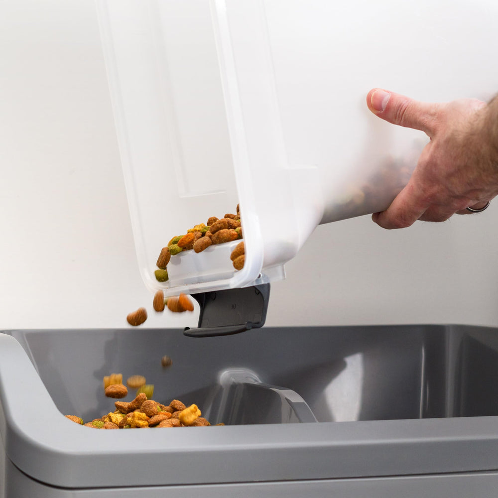 IRIS USA beside a cereal box to illustrate 13 lb capacity and compact scale for space planning
