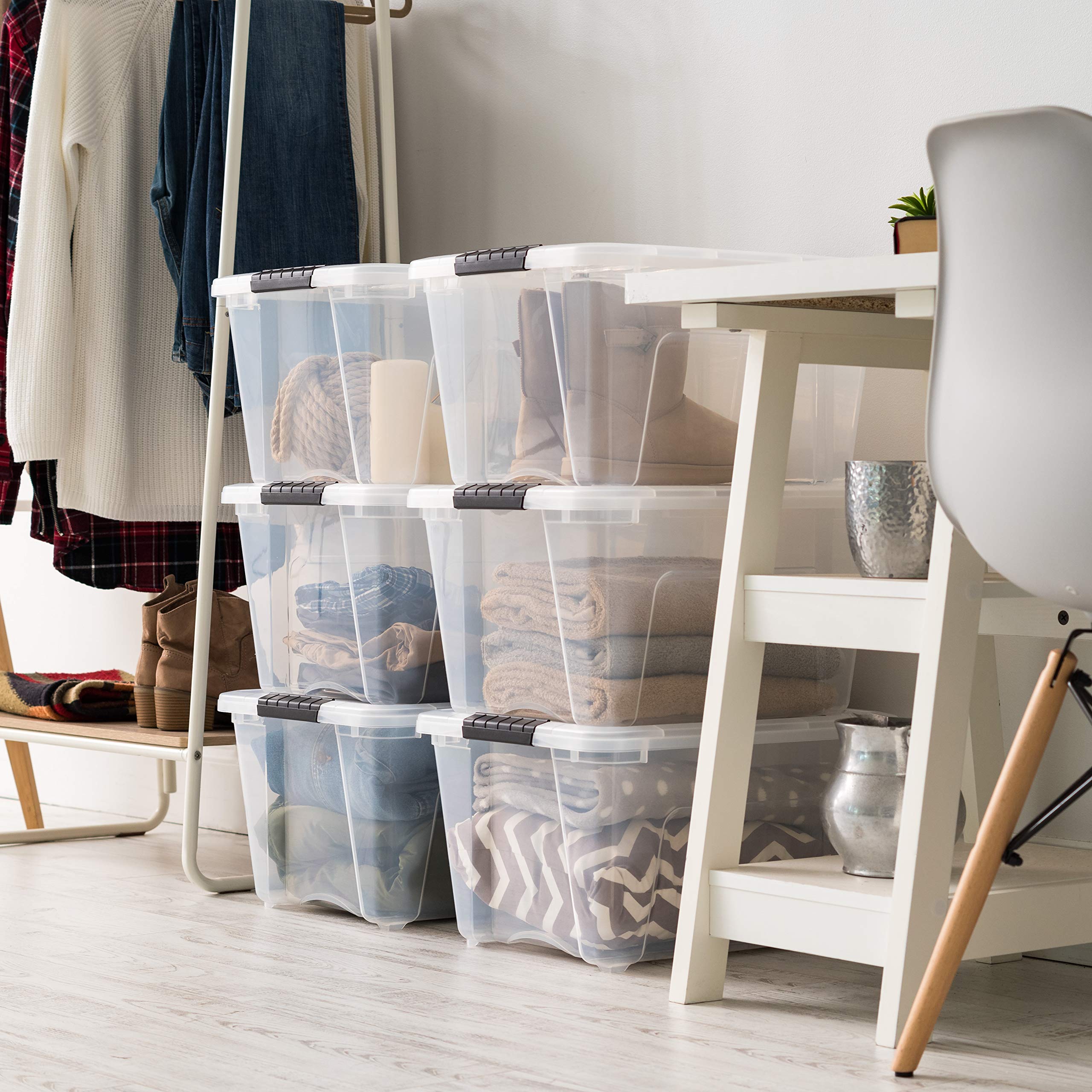 IRIS USA bin placed under bed demonstrating compact fit and easy retrieval