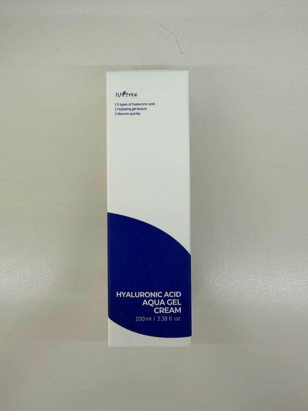IsNtree open jar revealing lightweight gel texture, easy absorption benefit