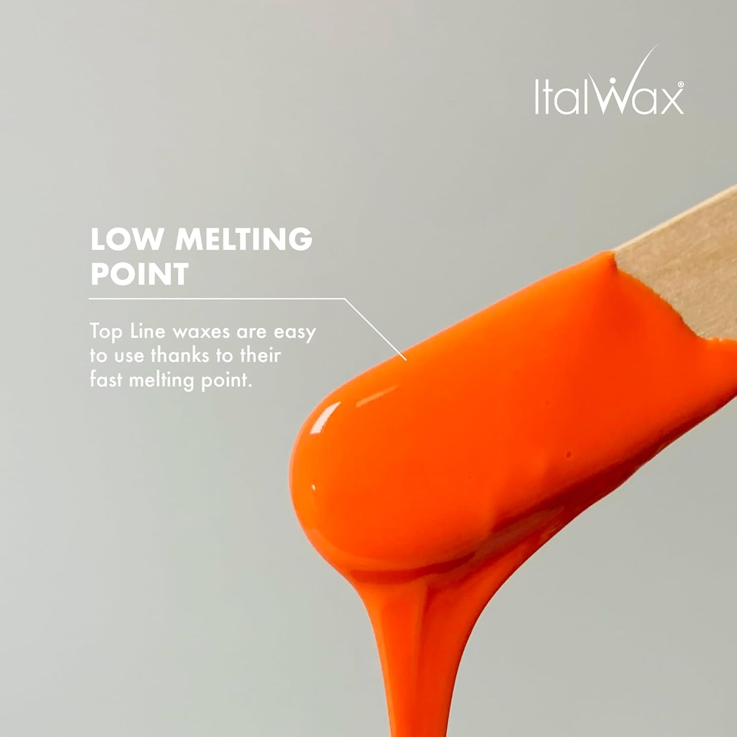 Italwax Coral melted on spatula illustrating smooth spreadability benefit