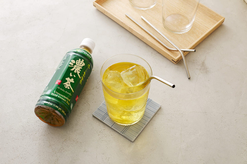 ITO EN pack with bottle next to everyday items to show portable serving size