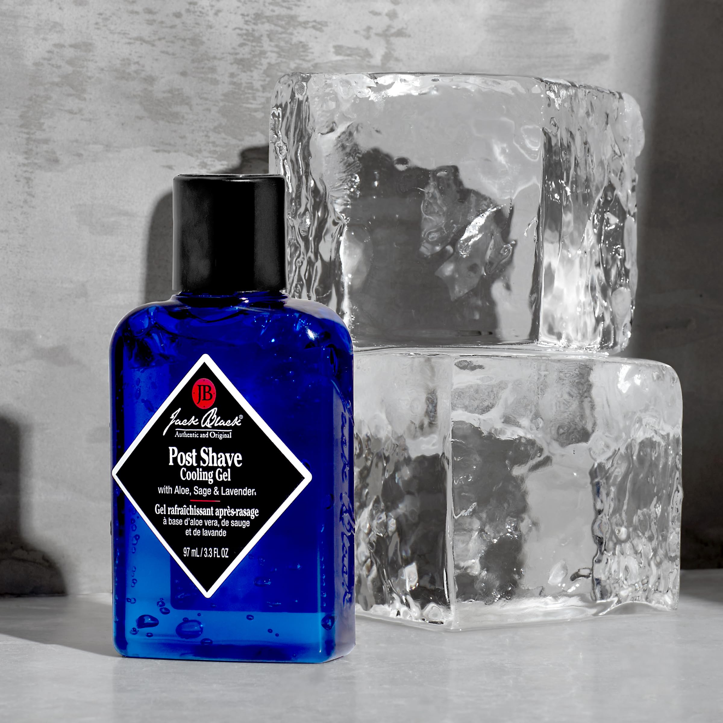 Jack Black gel next to ruler showing 3.3 fl oz size for travel and countertop convenience