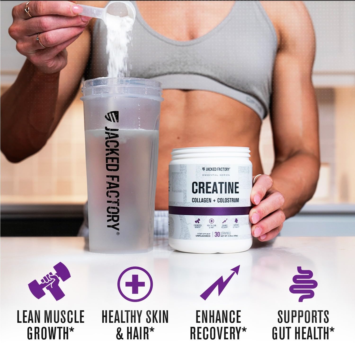 Glass of mixed Jacked Factory creatine for women showing easy dissolving and clarity