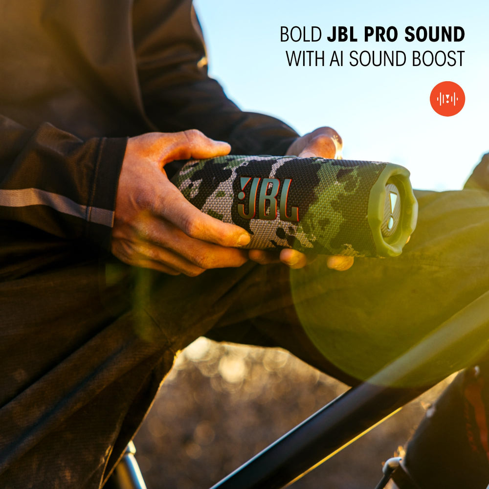 JBL Flip 7 held in hand to show compact size and portability