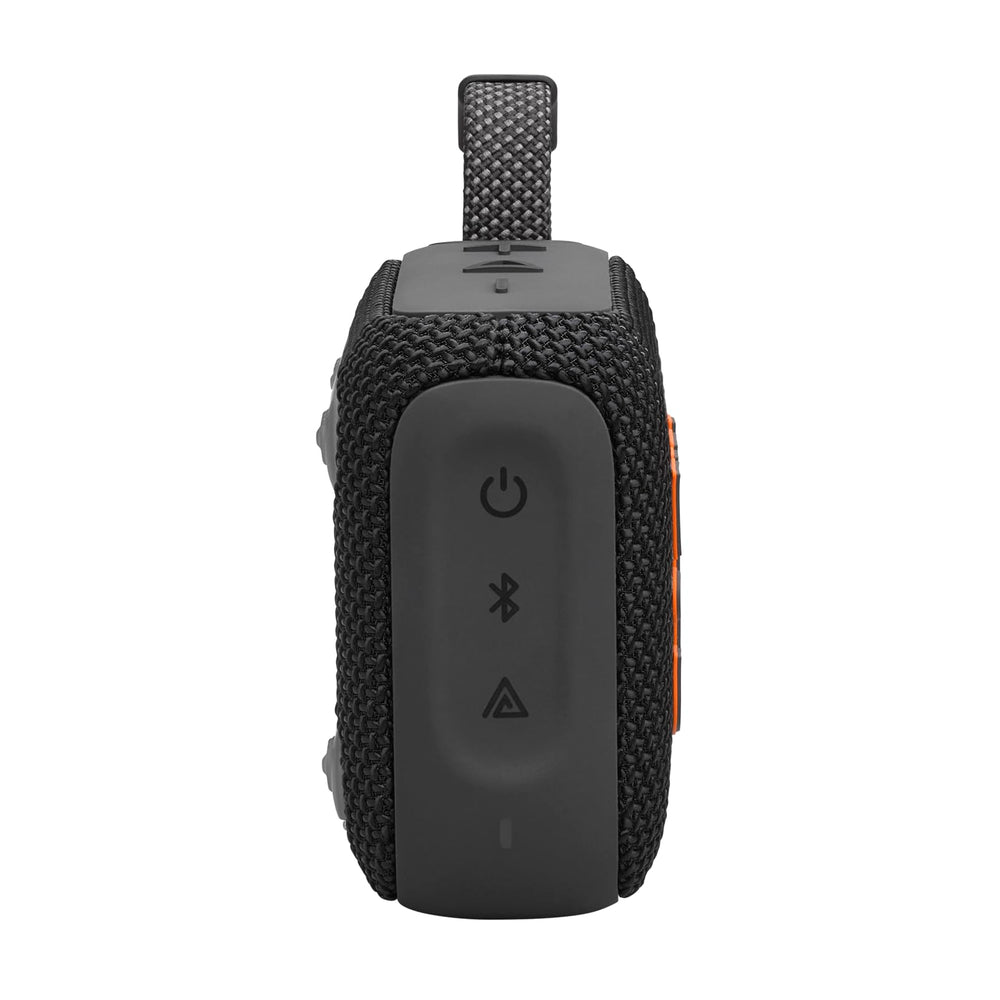 JBL Go 4 packaging and accessories arranged to show inclusions and setup