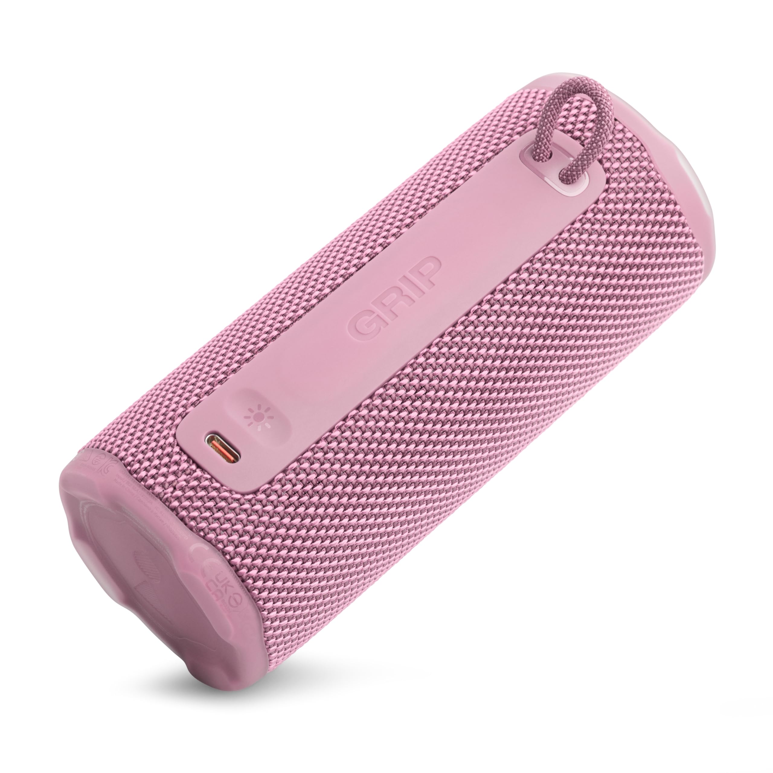 JBL Grip placed on coffee table creating ambient vibe and home listening benefit