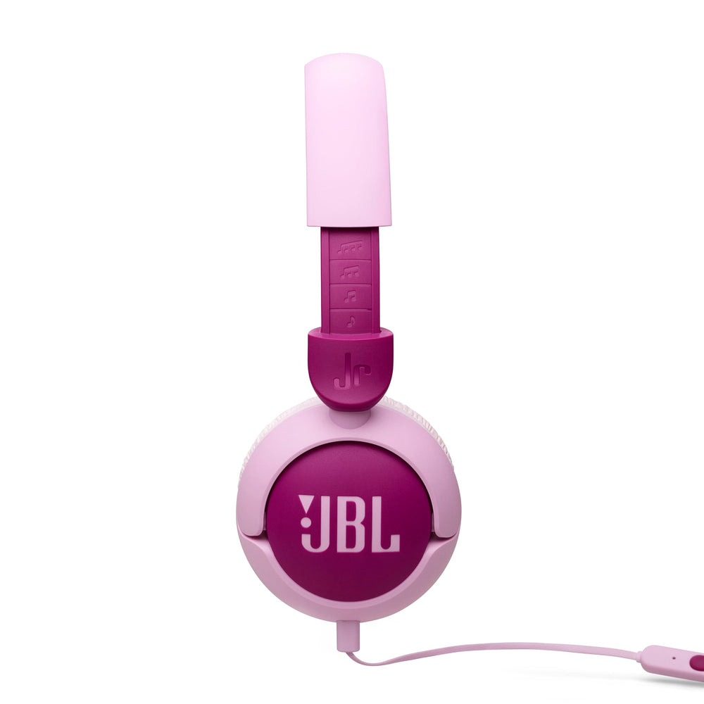 JBL Junior 320 next to a child’s book illustrating proper size for kids
