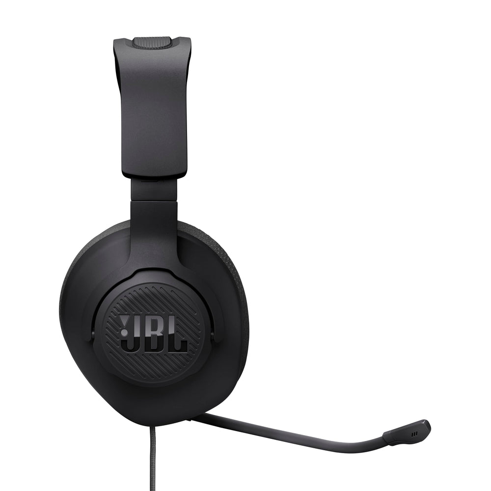 JBL Quantum 100M2 positioned with PC setup showing spatial audio compatibility