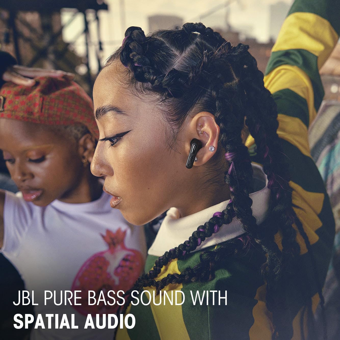 lifestyle image of a commuter wearing JBL Tune Flex 2 on a city train, showcasing noise control and on-the-go use