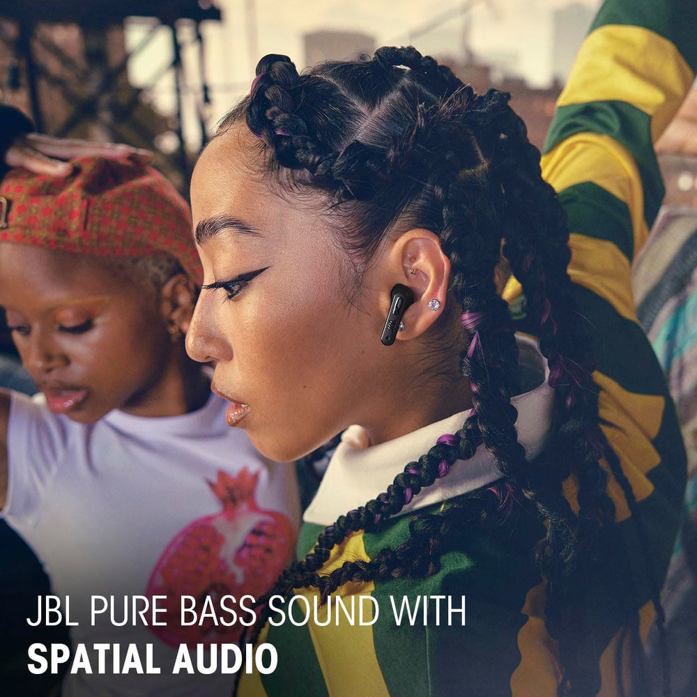 lifestyle image of a commuter wearing JBL Tune Flex 2 on a city train, showcasing noise control and on-the-go use