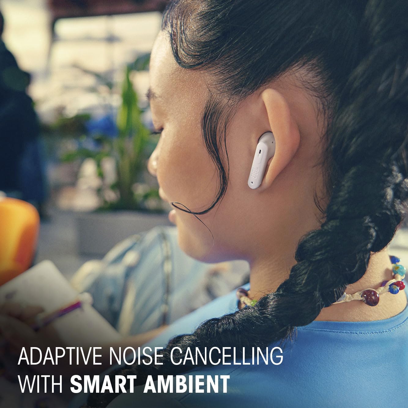 demonstration of touch controls on JBL Tune Flex 2 earbud, enabling playback and call management with taps