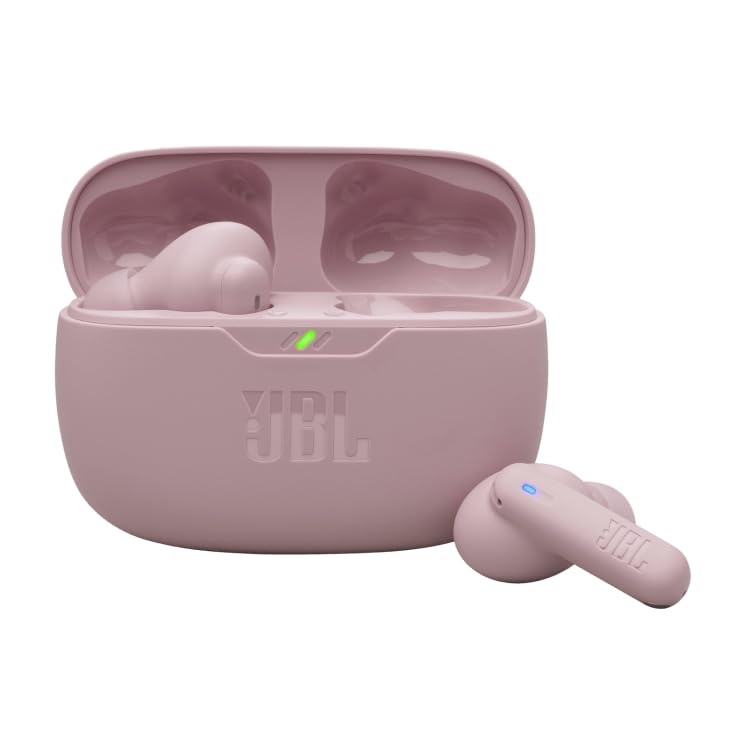 JBL Vibe Beam 2 worn in ear on a person demonstrating secure fit and active use