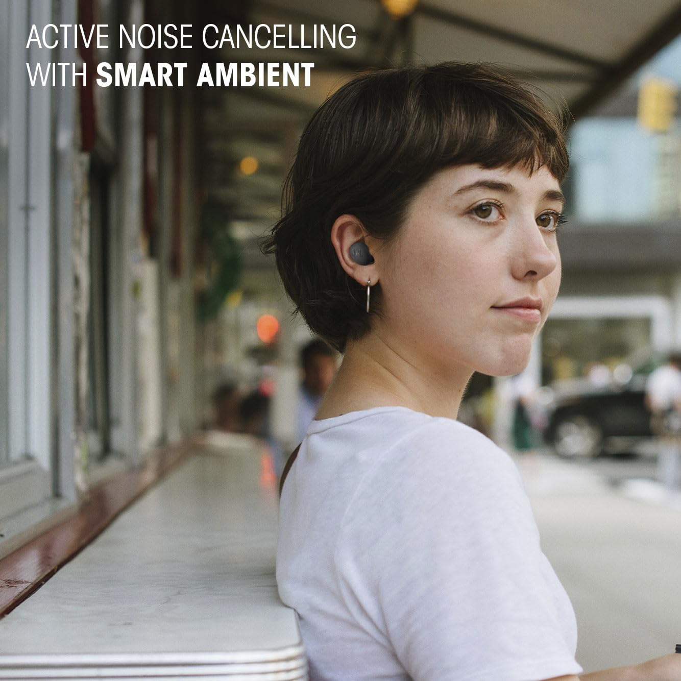 JBL Vibe Buds 2 with water droplets illustrating IP54 resistance for worry-free outdoor use