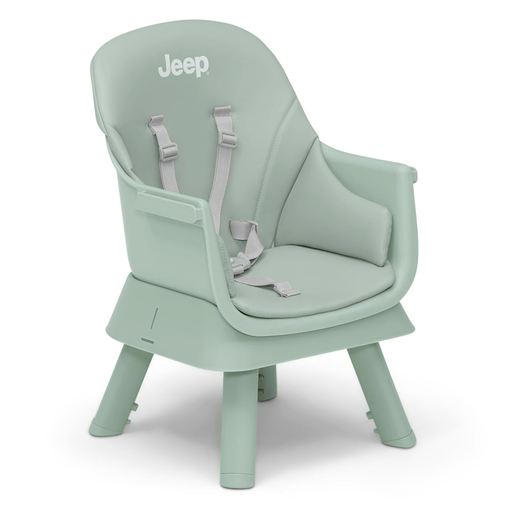 Delta Children high chair beside adult chair for scale to judge home fit and size