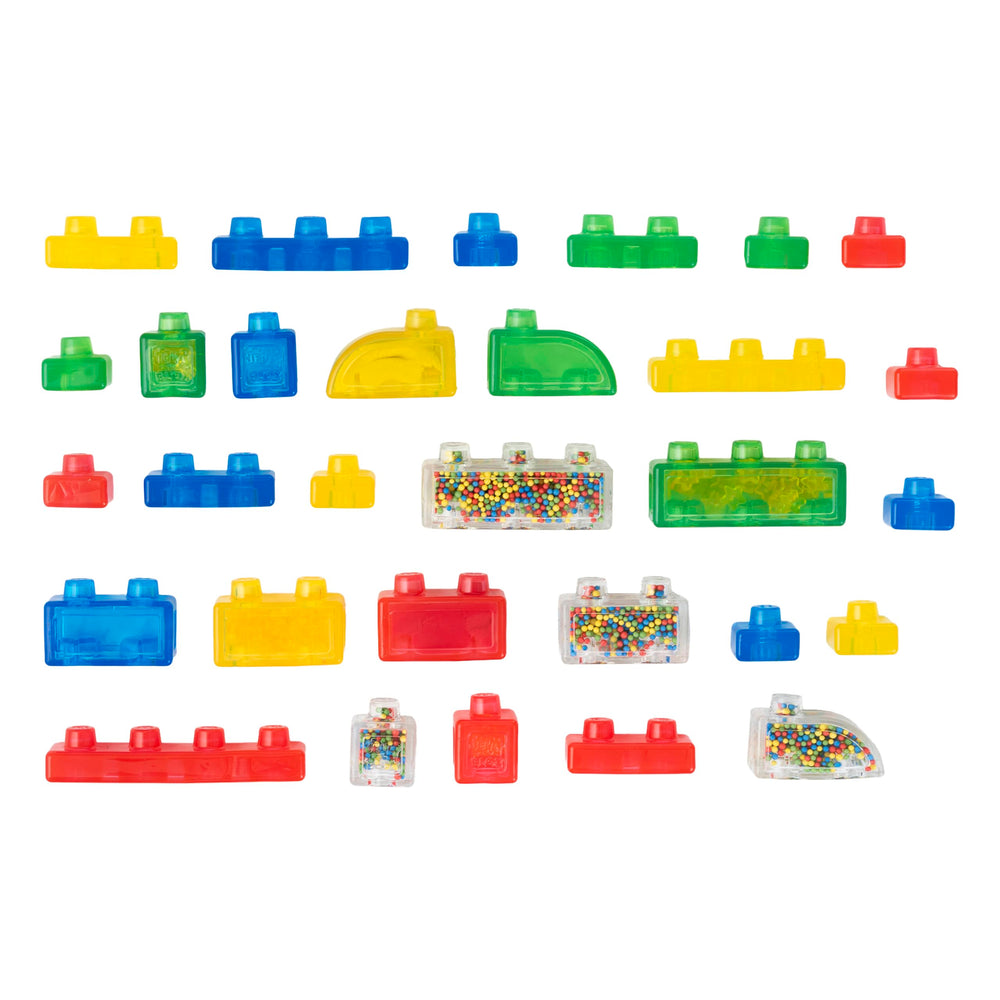 Jelly Blox colorful blocks spread across table, sparks creative play benefit